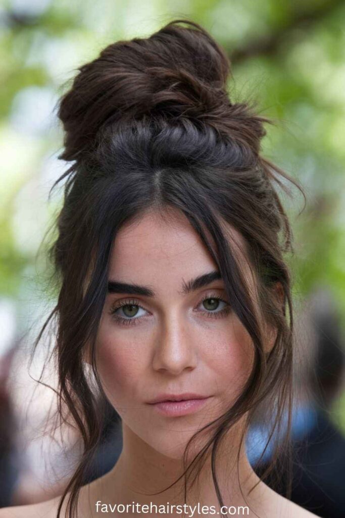 High Bun with Loose Strands