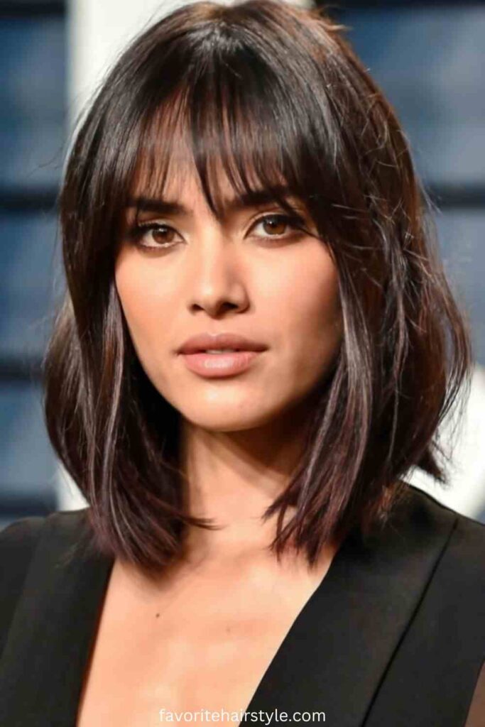 Layered Haircut with Curtain Bangs