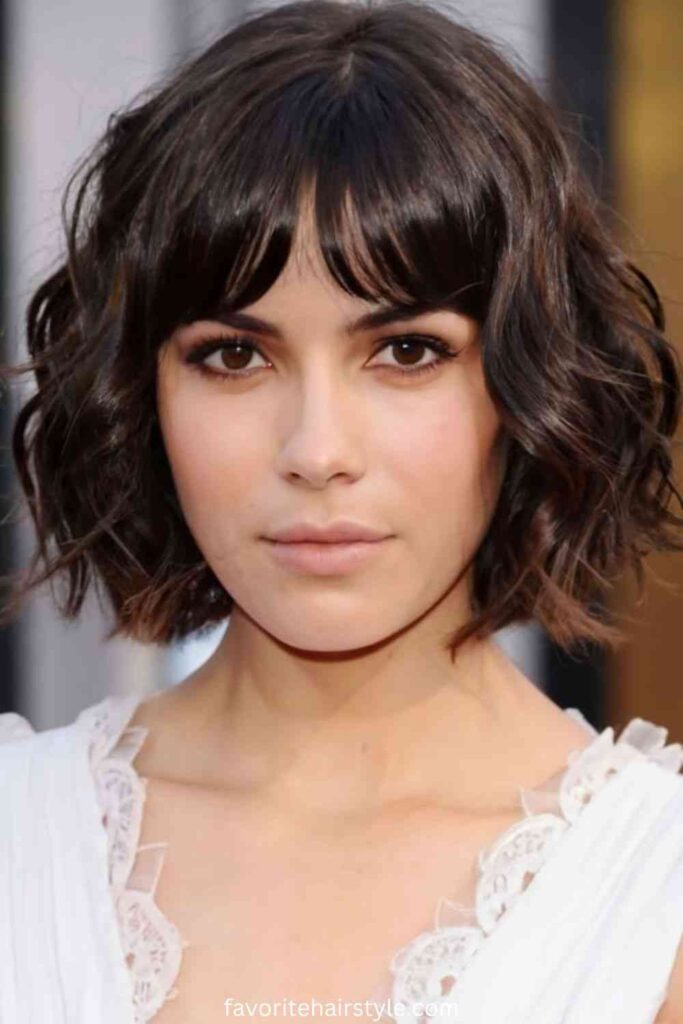 Side-Swept Bangs with Voluminous Waves