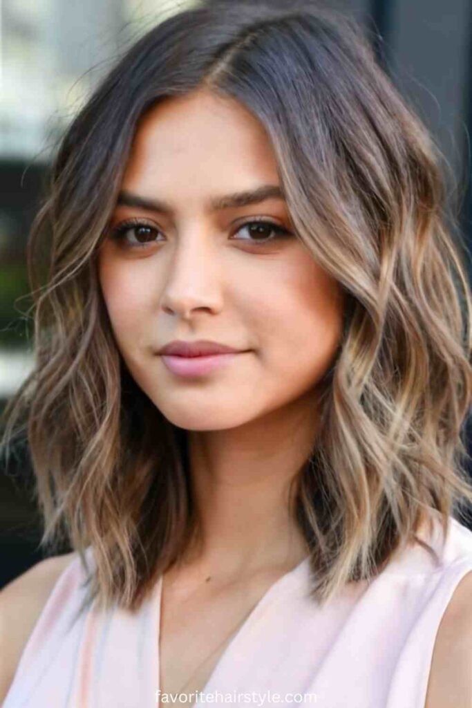 Layered Haircuts Ideas For Wavy Hair Textured Shoulder-Length Layers