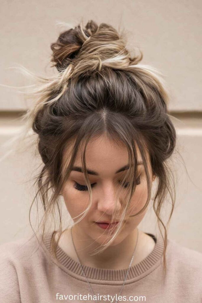 Messy Bun with Face-Framing Tendrils