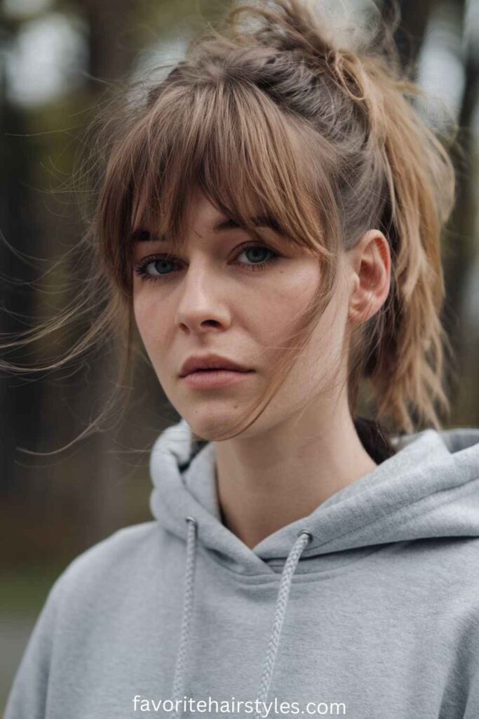 Wispy Bangs with a Messy Ponytail