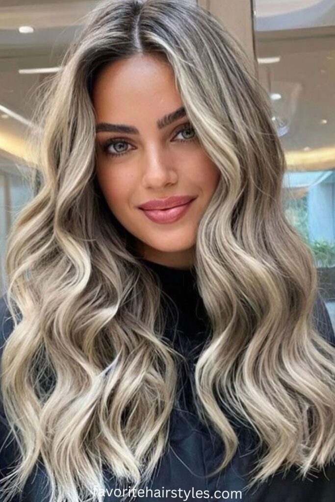Ash Blonde Balayage with Face-Framing Curtain Bangs