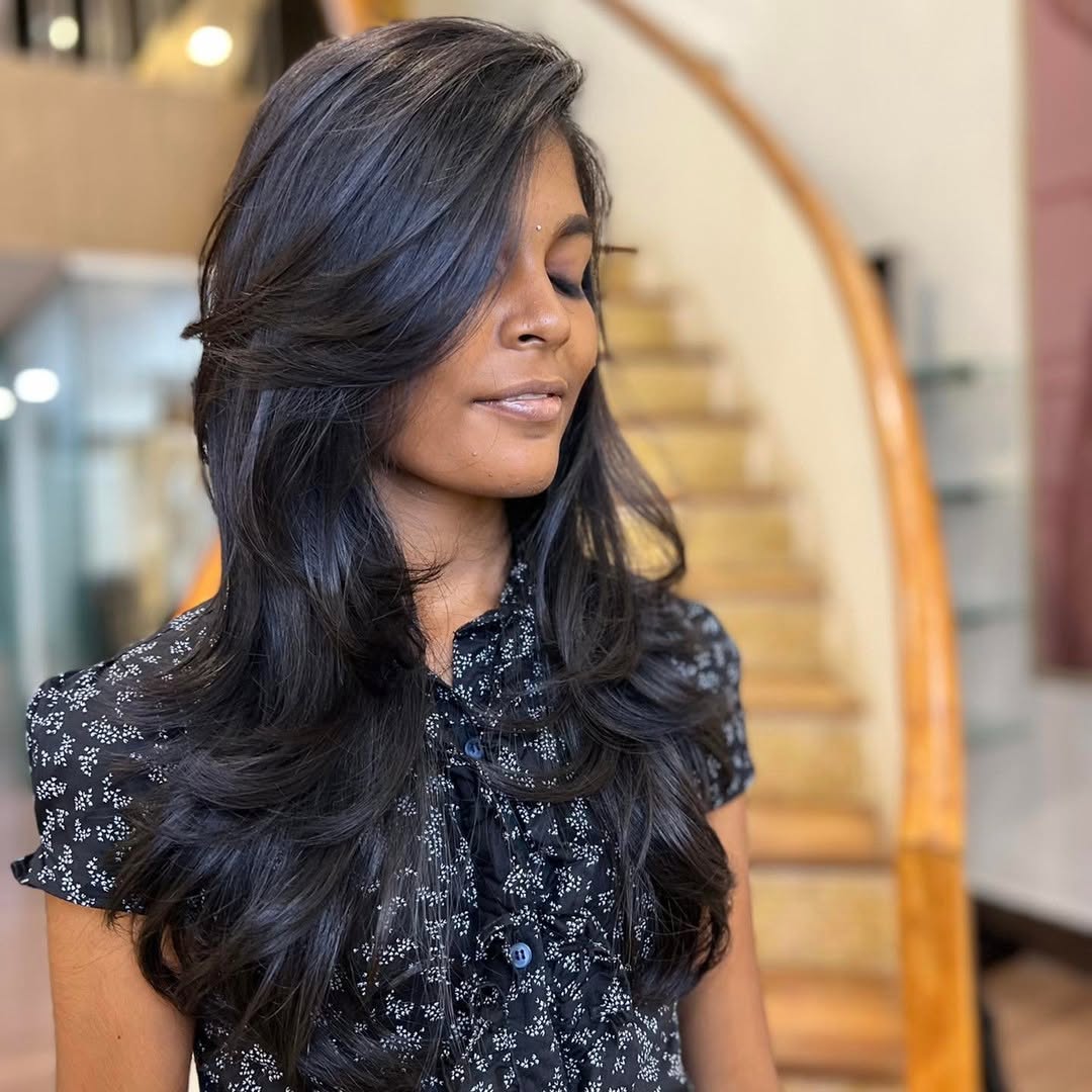 Women's Side-Swept Bangs Hairstyle for Oval Face