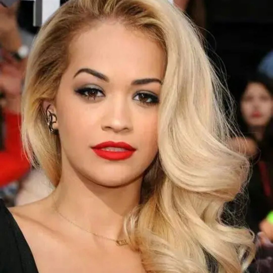 Women Deep Side Part Hairstyle for Round Face